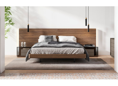 Dormitorio con mesitas de cristal en Valencia