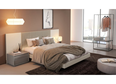 Dormitorio elegante con mesitas en Valencia