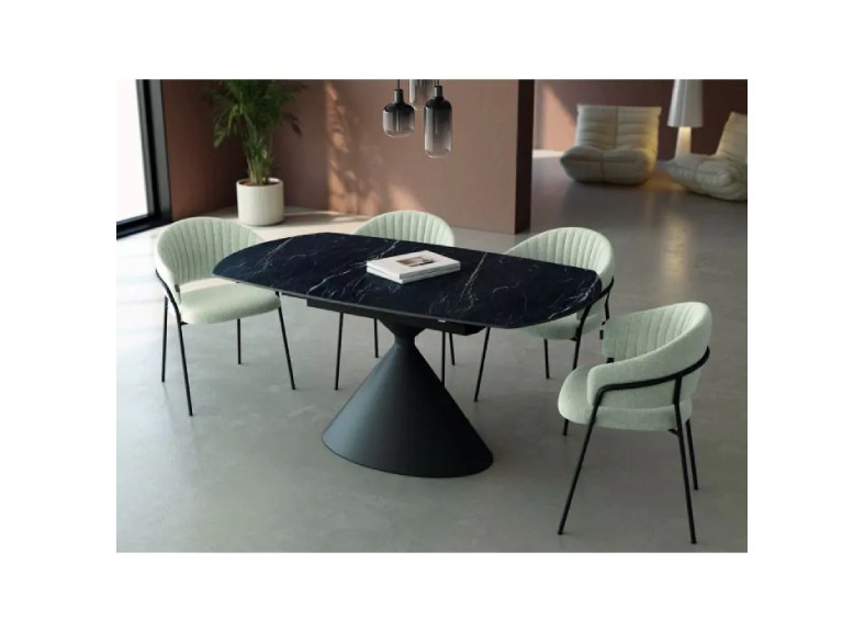 Mesa extensible giratoria con pata metálica central y tapa porcelánica en Valencia, Intermobel